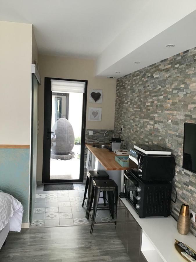 Cocoon Studio Apartment Gueron Exterior photo